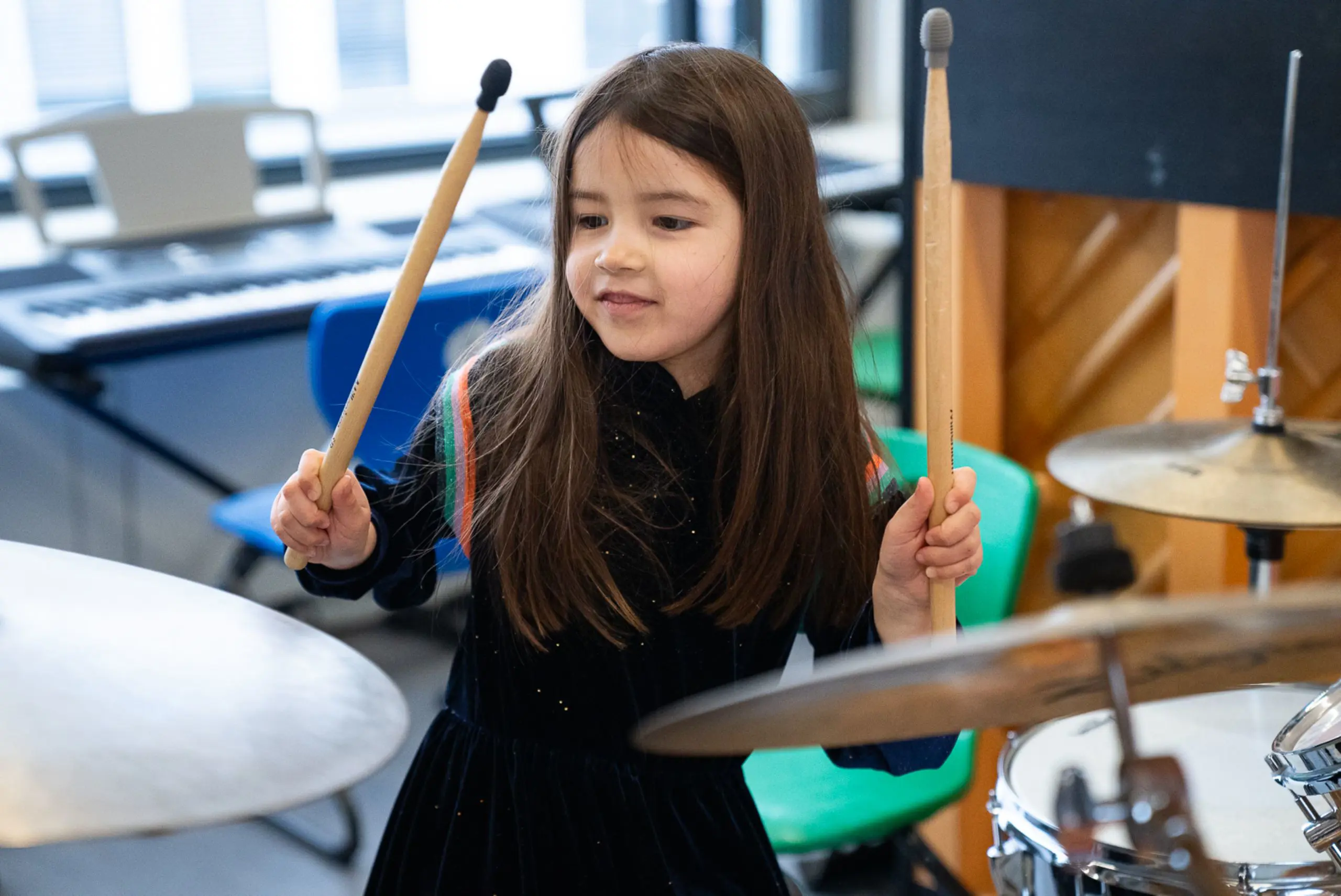 Girl playing drums