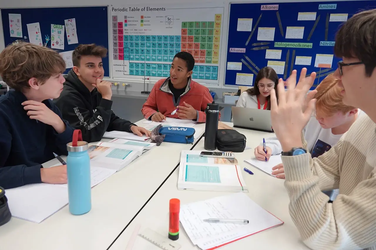 Students discussing work 